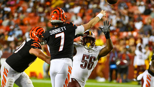 Aug 26, 2023; Landover, Maryland, USA; Washington Commanders defensive end Will Bradley-King (56) pressures Cincinnati Bengals quarterback Reid Sinnett (7) during the second half at FedExField. Mandatory Credit: Brad Mills-USA TODAY Sports  
