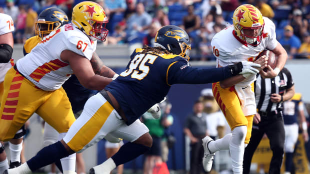 Apr 15, 2023; Memphis, TN, USA; Memphis Showboats defensive linemen Jordan Williams (95) tackles Philadelphia Stars quarterback Case Cookus (10) during the first half at Simmons Bank Liberty Stadium. Mandatory Credit: Petre Thomas-USA TODAY Sports