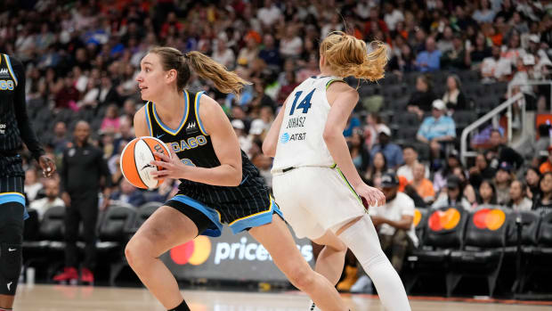 May 13, 2023; Toronto, Ontario, Canada; Chicago Sky forward Alanna Smith (8) rebounds against Minnesota Lynx forward Dorka Juhasz (14) during the second half at Scotiabank Arena.