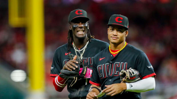 Sep 22, 2023; Cincinnati, Ohio, USA; Cincinnati Reds shortstop Elly De La Cruz (44) and third baseman Noelvi Marte (16) during the fifth inning against the Pittsburgh Pirates at Great American Ball Park. Mandatory Credit: Katie Stratman-USA TODAY Sports  