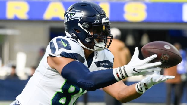 Seattle Seahawks tight end Noah Fant (87) catches a pass during pre-game drills before an NFL game against the Los Angeles Rams at SoFi Stadium.