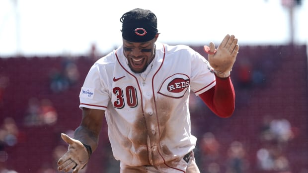 Sep 20, 2023; Cincinnati, Ohio, USA; Cincinnati Reds right fielder Will Benson (30) reacts after hitting a triple against the Minnesota Twins during the seventh inning at Great American Ball Park. Mandatory Credit: David Kohl-USA TODAY Sports 