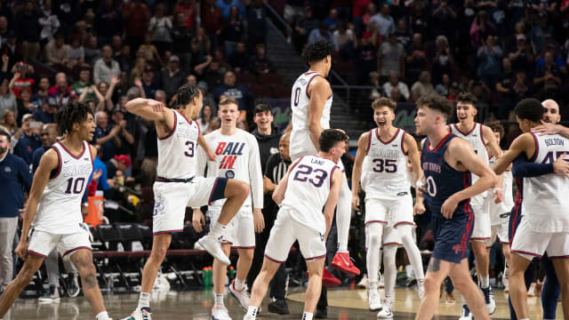 March 8, 2022; Las Vegas, NV, USA; Gonzaga Bulldogs celebrate after defeating the Saint Mary's Gaels after the game in the finals of the WCC Basketball Championships at Orleans Arena.
