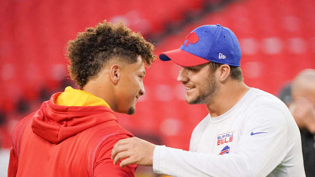 Oct 10, 2021; Kansas City, Missouri, USA; Kansas City Chiefs quarterback Patrick Mahomes (15) talks with Buffalo Bills quarterback Josh Allen (17) before warm ups at GEHA Field at Arrowhead Stadium. Mandatory Credit: Denny Medley-USA TODAY Sports