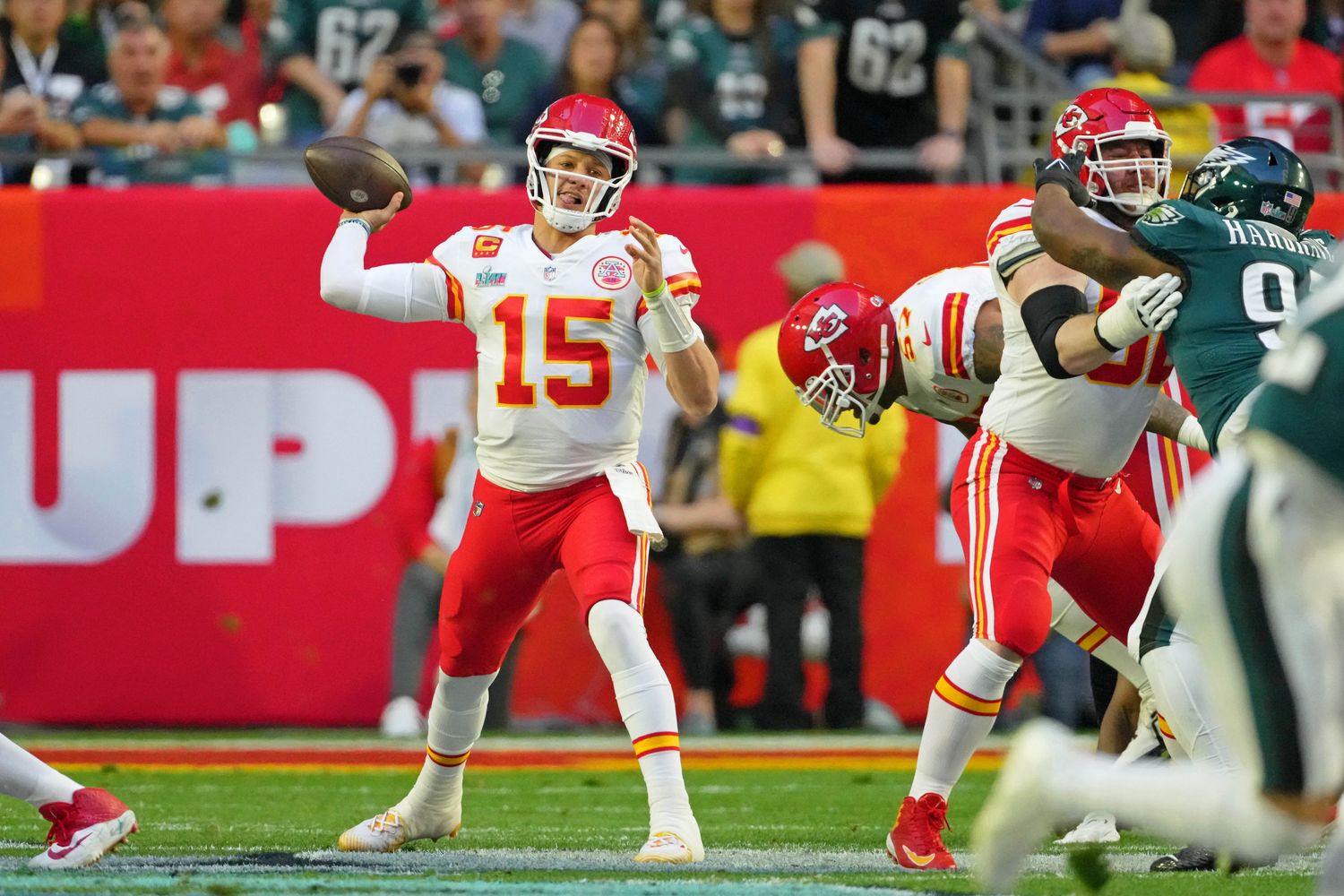 Feb 12, 2023; Glendale, Arizona, US; Kansas City Chiefs quarterback Patrick Mahomes (15) passes the ball against the Philadelphia Eagles during the first quarter of Super Bowl LVII at State Farm Stadium. Mandatory Credit: Kirby Lee-USA TODAY Sports