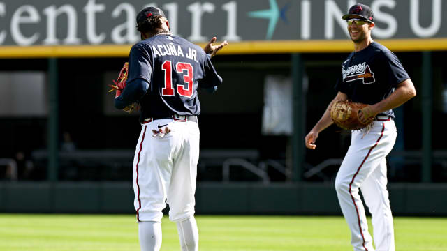 Feb 22, 2023; North Port, FL, USA; Atlanta Braves first baseman Matt Olson (28) and outfielder Ronald Acuna Jr. (13) run a drill during spring training.