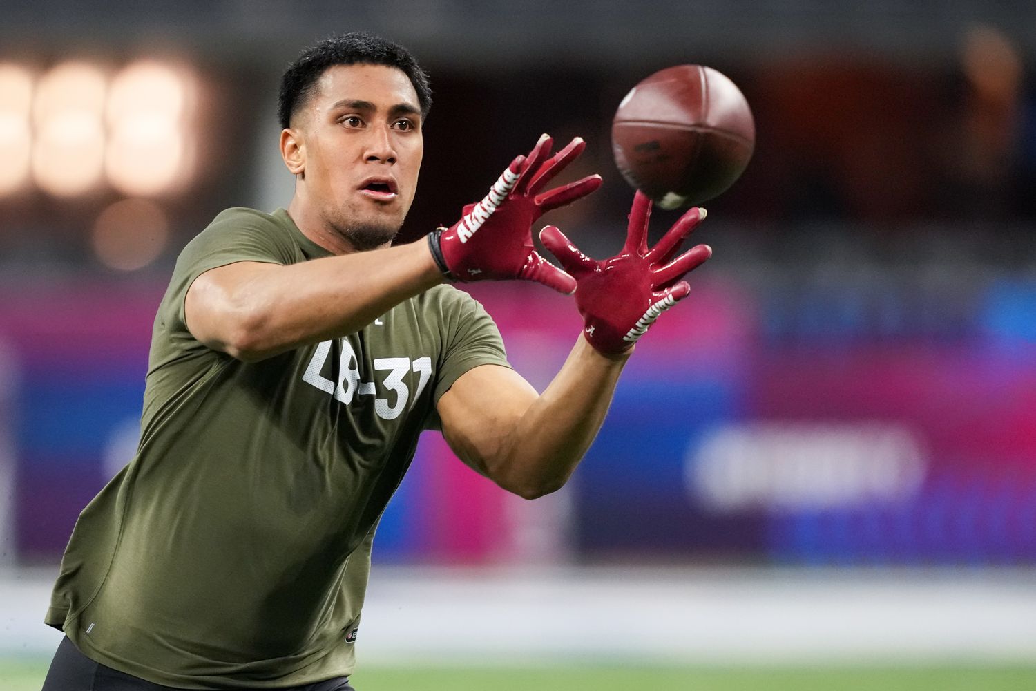 Alabama linebacker Henry To'oTo'o (LB31) participates in drills during the NFL Combine at Lucas Oil Stadium.