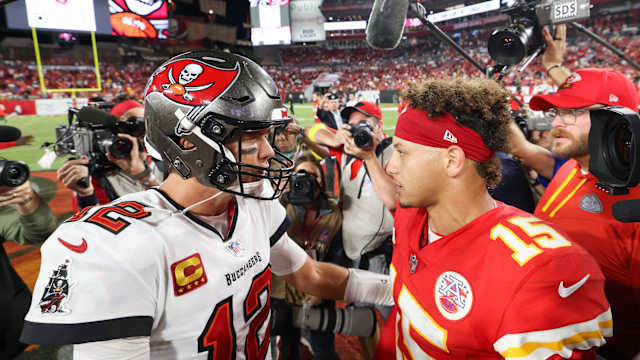 Oct 2, 2022; Tampa, Florida, USA; Tampa Bay Buccaneers quarterback Tom Brady (12) greets Kansas City Chiefs quarterback Patrick Mahomes (15) after a game at Raymond James Stadium. Mandatory Credit: Nathan Ray Seebeck-USA TODAY Sports
