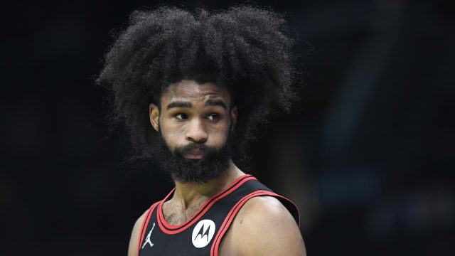 Chicago Bulls guard Coby White (0) in a time out during the second half against the Charlotte Hornets at the Spectrum Center.