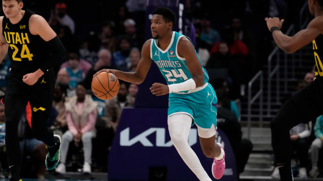 Charlotte Hornets forward Brandon Miller (24) brings the ball up court against the Utah Jazz during the second quarter at Spectrum Center.