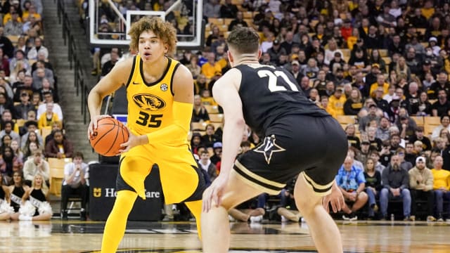 Jan 7, 2023; Columbia, Missouri, USA; Missouri Tigers forward Noah Carter (35) as Vanderbilt Commodores forward Liam Robbins (21) defends during the game at Mizzou Arena. Mandatory Credit: Denny Medley-USA TODAY Sports