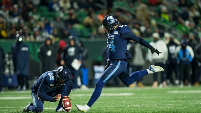 Nov 20, 2022; Regina, CAN; Toronto Argonauts kicker Boris Bede (14) kicks a field goal against the Winnipeg Blue Bombers in the second half. The Argonauts defeated the Blue Bombers to win the 2022 Grey Cup Championship at Mosaic Stadium. Toronto won 24-23. Mandatory Credit: Bob Frid-USA TODAY Sports