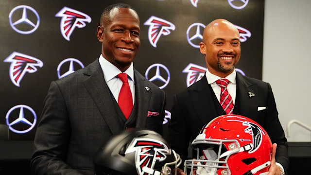 Feb 5, 2024; Atlanta, GA, USA; Atlanta Falcons head coach Raheem Morris and general manager Terry Fontenot pose for the media after Morris was introduced as the head coach of the Atlanta Falcons at Mercedes-Benz Stadium.