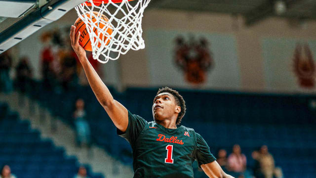 Mustangs' Zhuric Phelps with a layup against Rice on Wednesday night