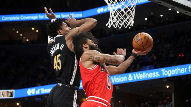 Chicago Bulls guard Coby White (0) shoots as Memphis Grizzlies forward GG Jackson (45) defends during the second half at FedExForum.