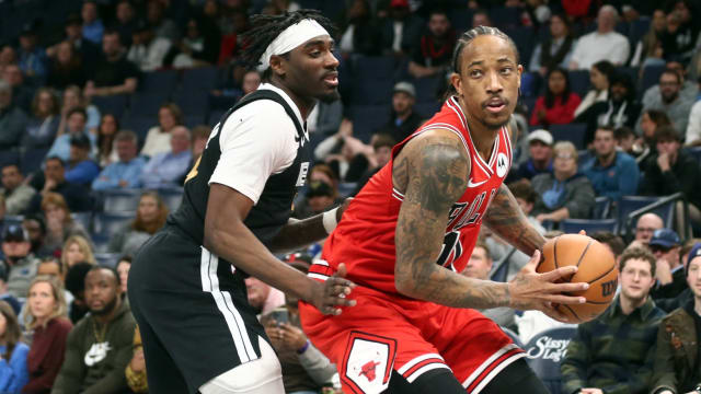 Chicago Bulls forward DeMar DeRozan (11) drives to the basket as Memphis Grizzlies guard Vince Williams Jr. (5) defends during the second half at FedExForum.