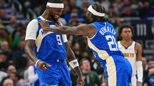 Milwaukee Bucks forward Bobby Portis (9) celebrates with guard Patrick Beverley (21)