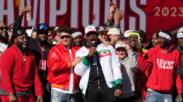 Feb 14, 2024; Kansas City, MO, USA; Kansas City Chiefs defensive tackle Chris Jones (95) addresses the crowd on stage with quarterback Patrick Mahomes (15) during the celebration of the Kansas City Chiefs winning Super Bowl LVIII. Mandatory Credit: Kirby Lee-USA TODAY Sports  