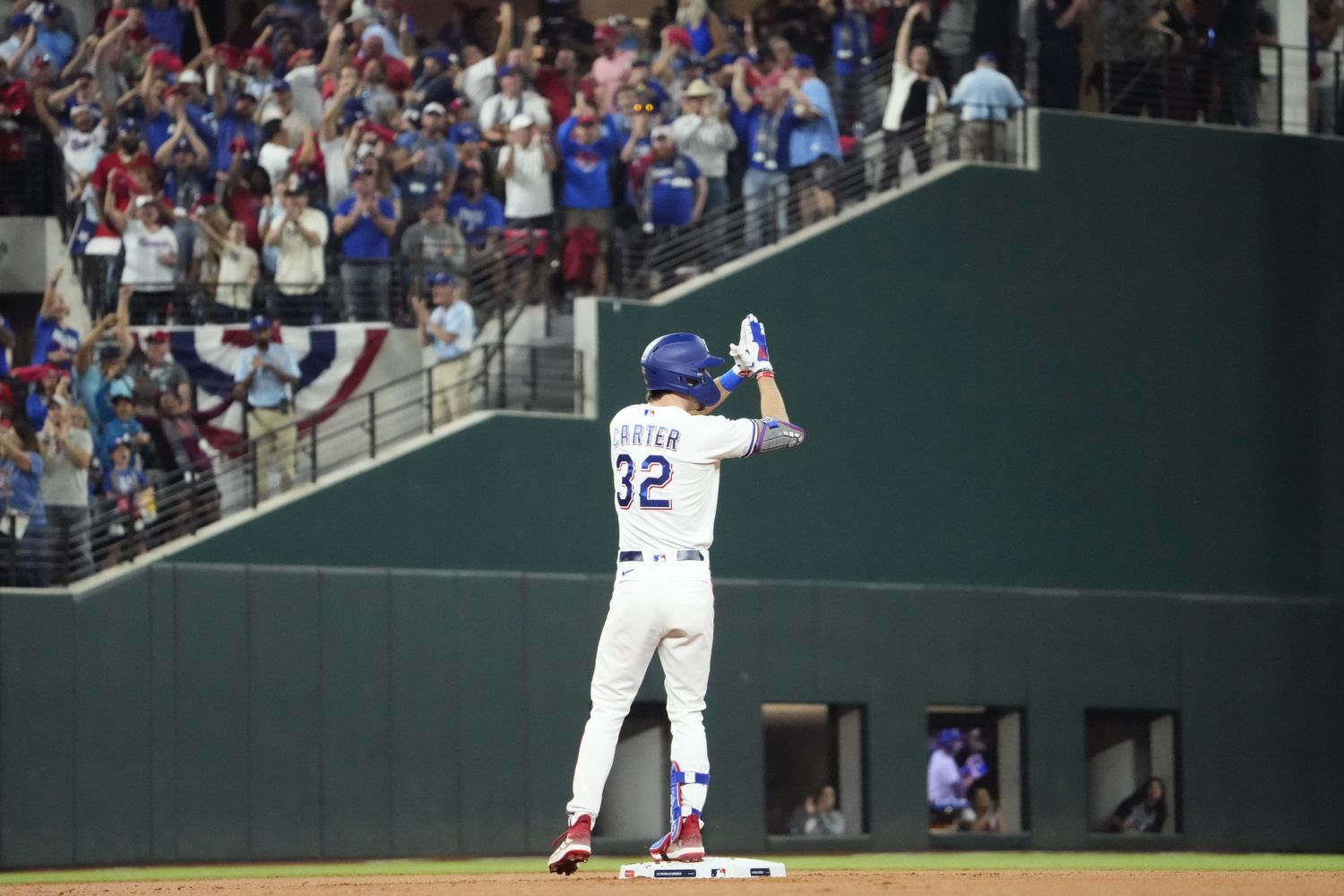 Texas Rangers left fielder Evan Carter celebrates after hitting an RBI double against the Arizona Diamondbacks during the first inning in Game 1 of the 2023 World Series at Globe Life Field in Arlington on Oct. 27.