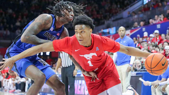 SMU's Zhuric Phelps drives against Memphis
