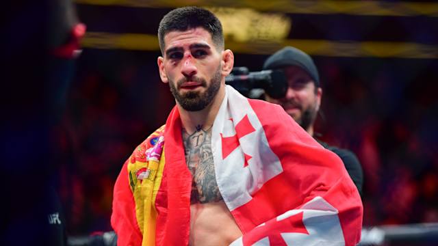 Feb 17, 2024; Anaheim, California, USA; Ilia Topuria celebrates his championship victory against Alexander Volkanovski during UFC 298 at Honda Center. Mandatory Credit: Gary A. Vasquez-USA TODAY Sports