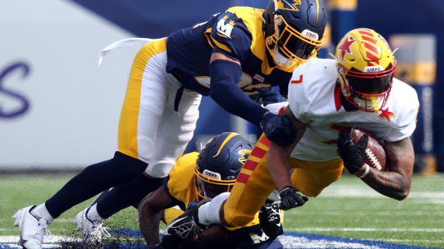 Apr 15, 2023; Memphis, TN, USA; Memphis Showboats defensive back Troy Warner (22) and defensive back Stephen Griffin (40) tackle Philadelphia Stars wide receiver Devin Gray (7) after a catch during the first half at Simmons Bank Liberty Stadium. Mandatory Credit: Petre Thomas-USA TODAY Sports  
