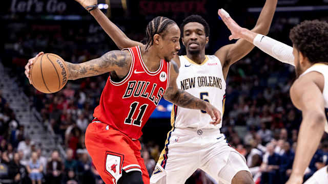 Chicago Bulls forward DeMar DeRozan (11) looks to pass the ball against New Orleans Pelicans forward Herbert Jones (5) during the second half at Smoothie King Center. 