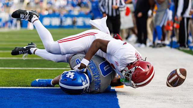 Nov 11, 2023; Lexington, Kentucky, USA; Alabama Crimson Tide defensive back Kool-Aid McKinstry (1) tackles Kentucky Wildcats running back Demie Sumo-Karngbaye (0) during the third quarter at Kroger Field.