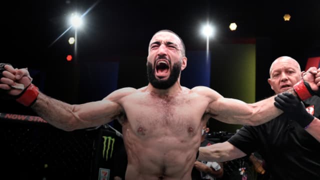 UFC welterweight Belal Muhammad celebrates a victory inside the Octagon.