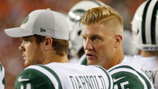 Aug 16, 2018; Landover, MD, USA; New York Jets quarterback Josh McCown (15) talks to Jets quarterback Sam Darnold (14) on the bench against the Washington Redskins in the third quarter at FedEx Field. The Redskins won 15-13.