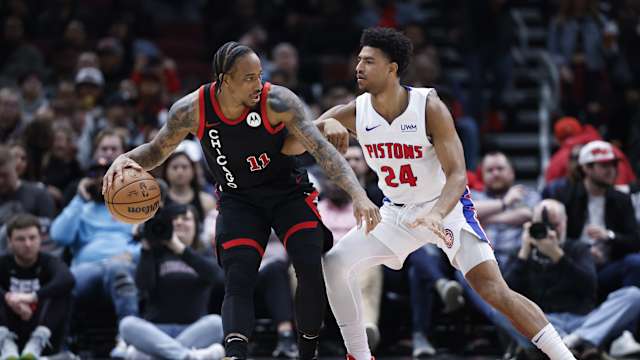 Detroit Pistons guard Quentin Grimes (24) defends against Chicago Bulls forward DeMar DeRozan (11) during the first half at United Center.
