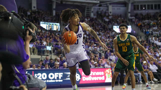 Micah Peavy keeping ball inbounds against Baylor on February 26, 2024.