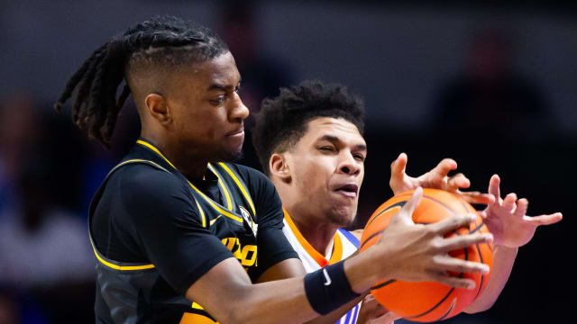 Florida Gators guard Will Richard (5) and Missouri Tigers guard Sean East II (55) go after a loose ball during the first half. The Florida men s basketball team hosted the Missouri Tigers at Exactech Arena at the Stephen C. O Connell Center in Gainesville, FL on Wednesday, February 28, 2024. 