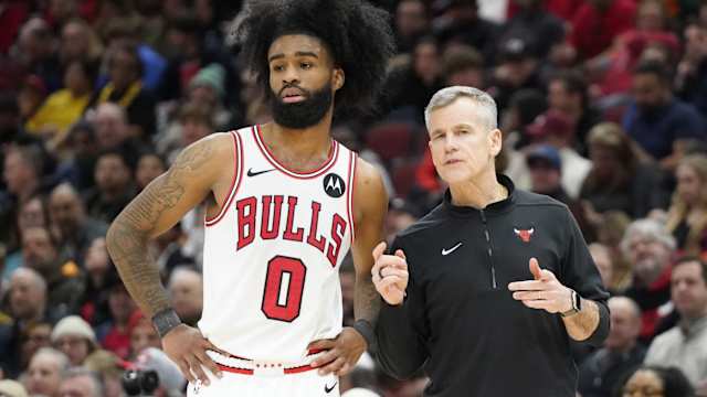 Chicago Bulls guard Coby White (0) talks with head coach Billy Donovan 