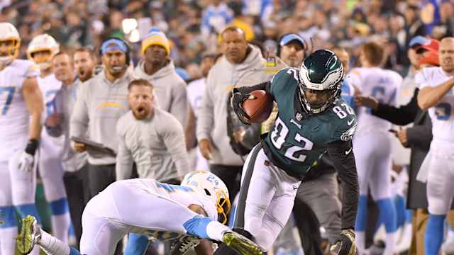 Nov 7, 2021; Philadelphia, Pennsylvania, USA; Philadelphia Eagles wide receiver John Hightower (82) is tackled by Los Angeles Chargers safety Nasir Adderley (24) at Lincoln Financial Field. Mandatory Credit: Eric Hartline-USA TODAY Sports  