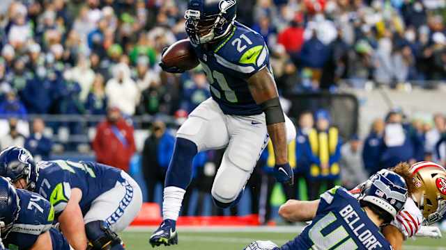Dec 5, 2021; Seattle, Washington, USA; Seattle Seahawks running back Adrian Peterson (21) rushes against the San Francisco 49ers during the fourth quarter at Lumen Field. Mandatory Credit: Joe Nicholson-USA TODAY Sports