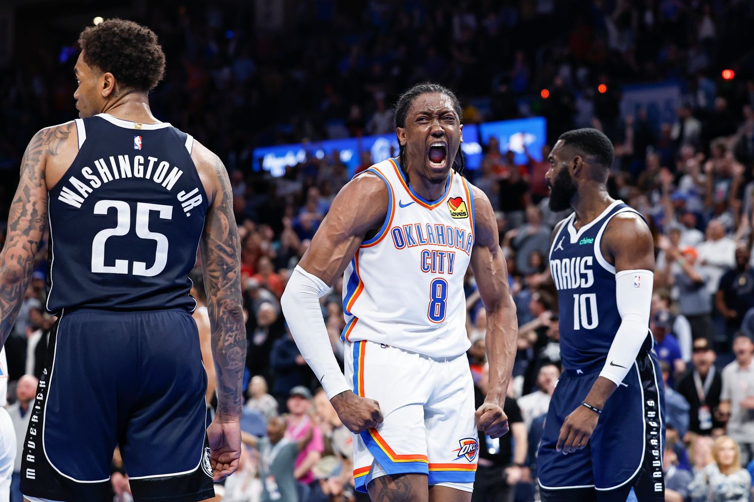 Mar 14, 2024; Oklahoma City, Oklahoma, USA; Oklahoma City Thunder forward Jalen Williams (8) celebrates after dunking against the Dallas Mavericks during the second half at Paycom Center.