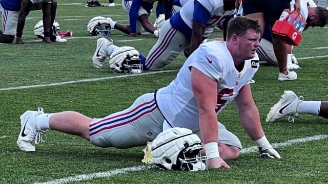 New York Giants center John Michael Schmitz during warm-ups prior to a training camp practice.
