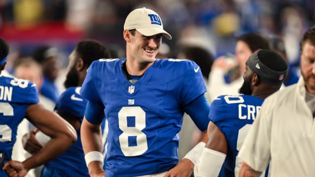 Aug 18, 2023; East Rutherford, New Jersey, USA; New York Giants quarterback Daniel Jones (8) chats with New York Giants wide receiver Jamison Crowder (80) during the fourth quarter against the Carolina Panthers at MetLife Stadium.
