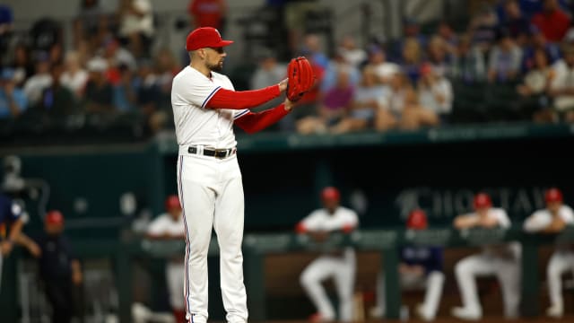 Sep 5, 2023; Arlington, Texas, USA; Texas Rangers starting pitcher Nathan Eovaldi (17) gets ready to throw a pitch in the first inning against the Houston Astros at Globe Life Field. Mandatory Credit: Tim Heitman-USA TODAY Sports