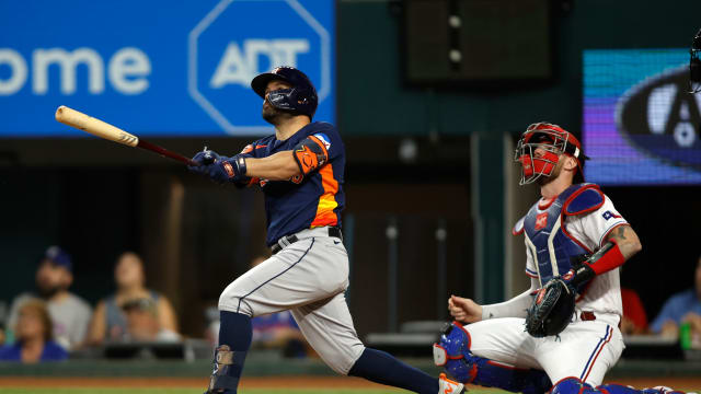 Sep 5, 2023; Arlington, Texas, USA; Houston Astros second baseman Jose Altuve (27) hits a solo home run in the first inning against the Texas Rangers at Globe Life Field. Mandatory Credit: Tim Heitman-USA TODAY Sports