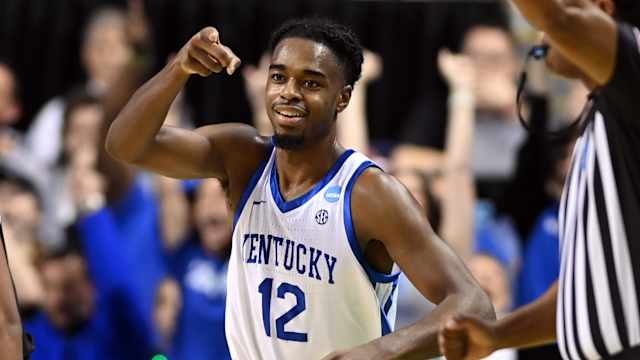 Mar 17, 2023; Greensboro, NC, USA; Kentucky Wildcats guard Antonio Reeves (12) celebrates in the first half against the Providence Friars at Greensboro Coliseum. Mandatory Credit: Bob Donnan-USA TODAY Sports  