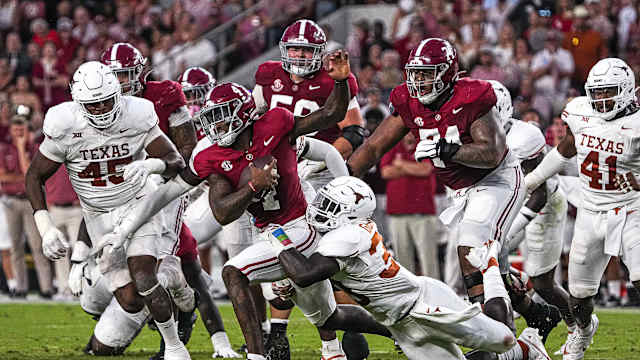 Alabama quarterback Jalen Milroe (4) is sacked by Texas Longhorns linebacker David Gbenda (3) during the game at Bryant-Denny Stadium on Saturday, Sep. 9, 2023 in Tuscaloosa, Alabama.