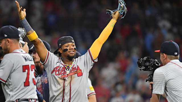 Sep 13, 2023; Philadelphia, Pennsylvania, USA; Atlanta Braves right fielder Ronald Acuna Jr. (13) celebrates their 6th straight National League East title with win against the Philadelphia Phillies at Citizens Bank Park.