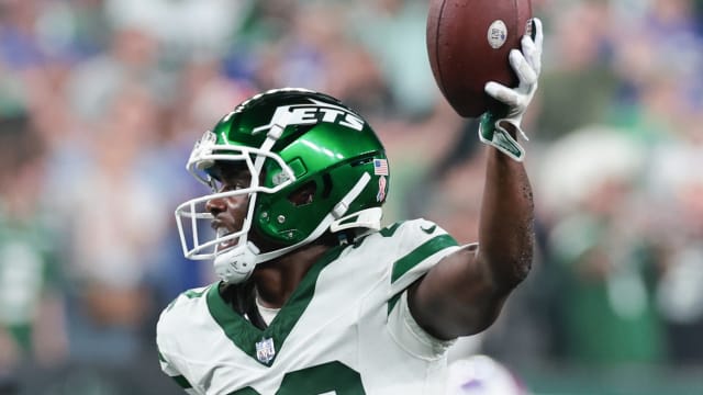 Jets' safety Tony Adams after recovering a fumble against Buffalo