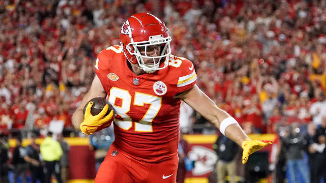 Oct 12, 2023; Kansas City, Missouri, USA; Kansas City Chiefs tight end Travis Kelce (87) runs the ball against the Denver Broncos during the first half at GEHA Field at Arrowhead Stadium. Mandatory Credit: Denny Medley-USA TODAY Sports  
