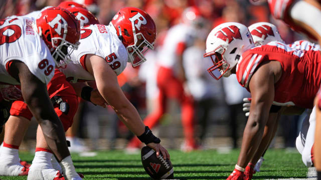 Oct 7, 2023; Madison, Wisconsin, USA; The Rutgers Scarlet Knights line up for a play during the game against the Wisconsin Badgers at Camp Randall Stadium. Mandatory Credit: Jeff Hanisch-USA TODAY Sports