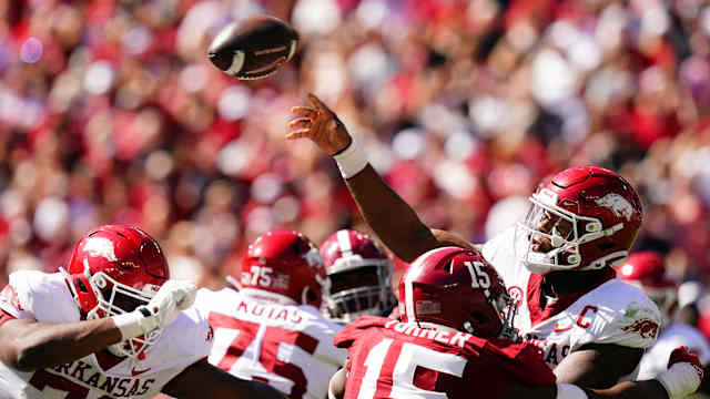 Arkansas Razorbacks quarterback KJ Jefferson (1) passing against the Alabama Crimson Tide during the second half at Bryant-Denny Stadium.