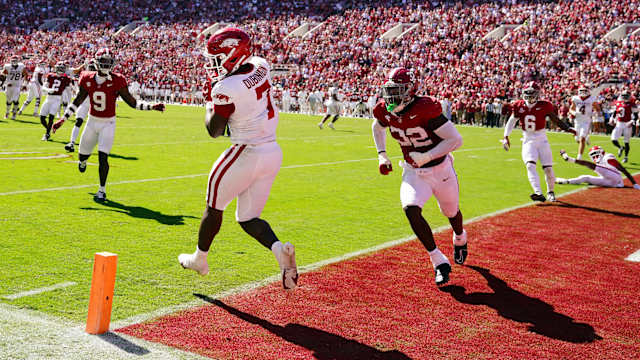 Oct 14, 2023; Tuscaloosa, Alabama, USA; Arkansas Razorbacks running back Rashod Dubinion (7) pulls down a touchdown pass against the Alabama Crimson Tide during the second half at Bryant-Denny Stadium.