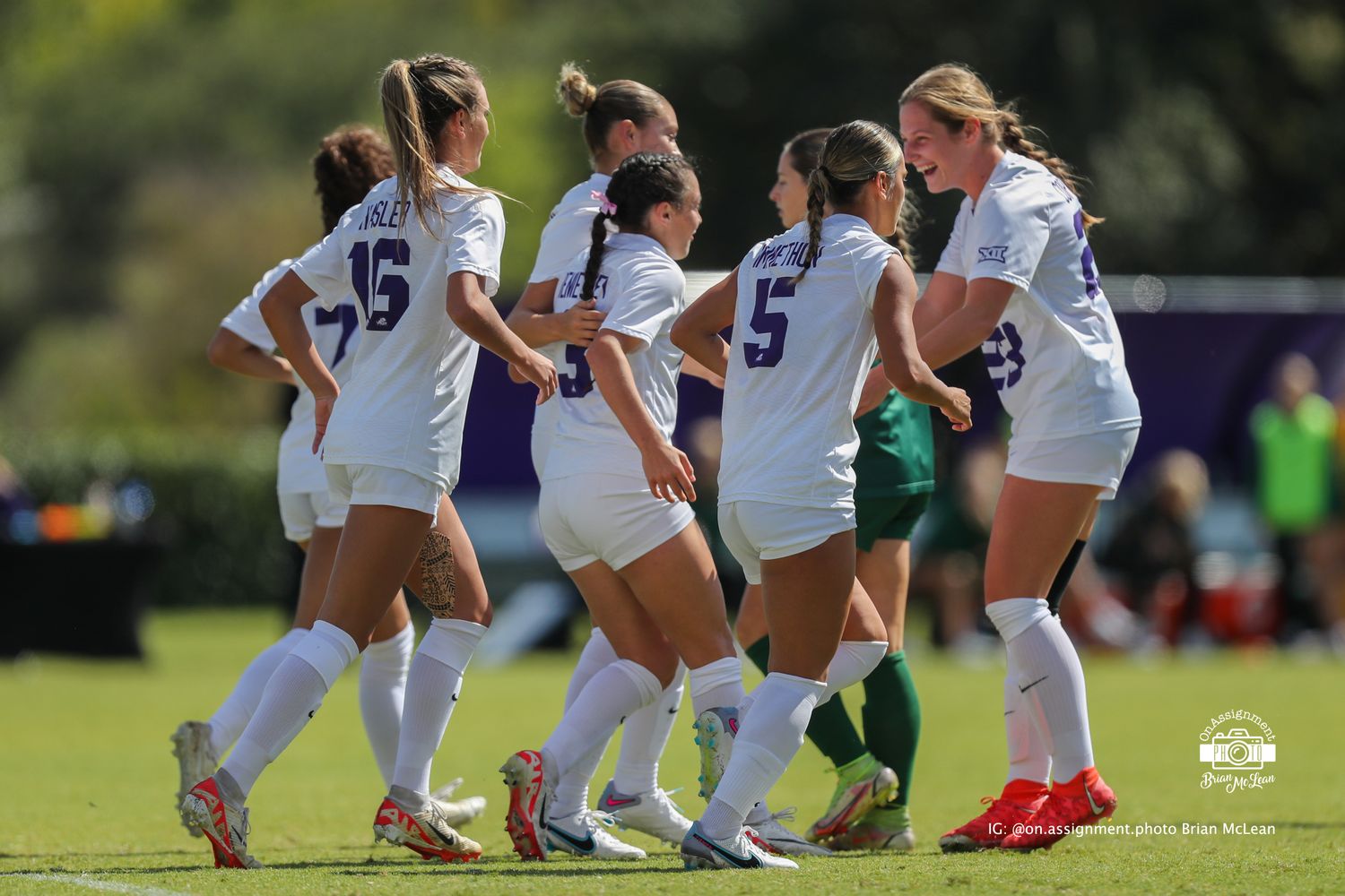 A.J. Hennessey (3) and the Frogs celebrate after her penalty in the 8th minute.